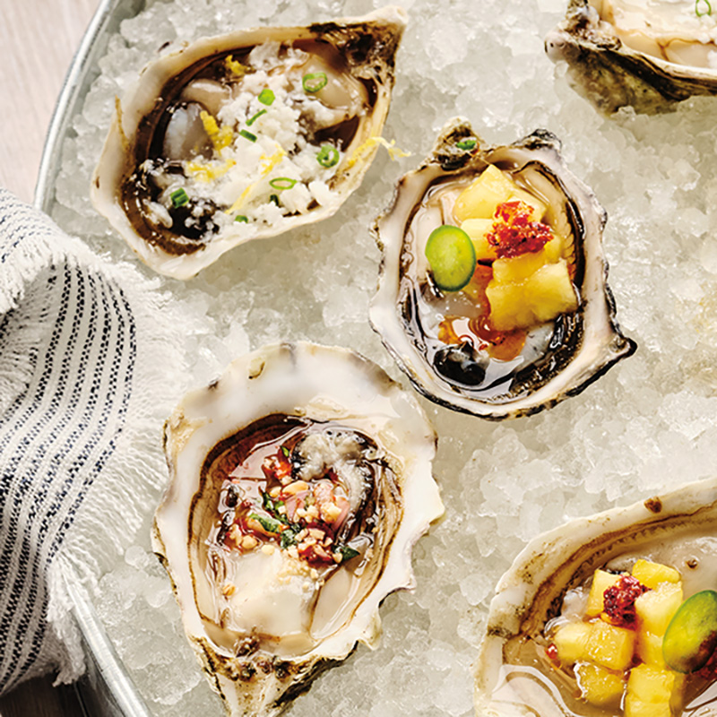 BC Oysters Served with Topping Trio BCLIQUOR